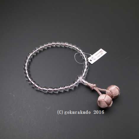 数珠 女性用 総水晶（7mm玉）抑えたピンク色利休房の画像