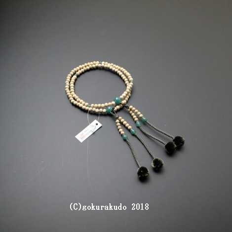 数珠 真言宗 星月菩提樹 8寸 翡翠（アベン）入り 苔色菊房の画像