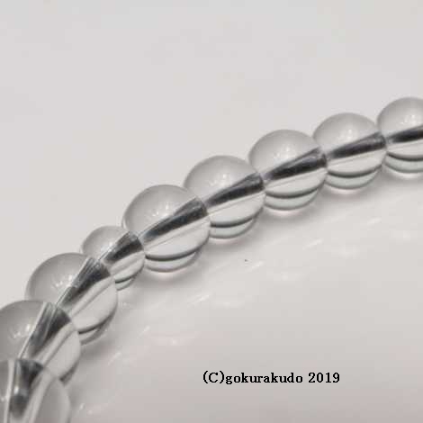 数珠 女性用 総水晶丸玉（主玉7mm）正絹頭付房 黒色の画像