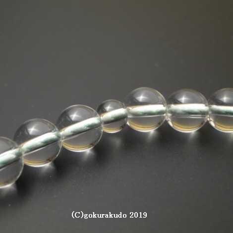 数珠 女性用 総水晶丸玉（主玉7mm）正絹頭付房 ひわ色の画像