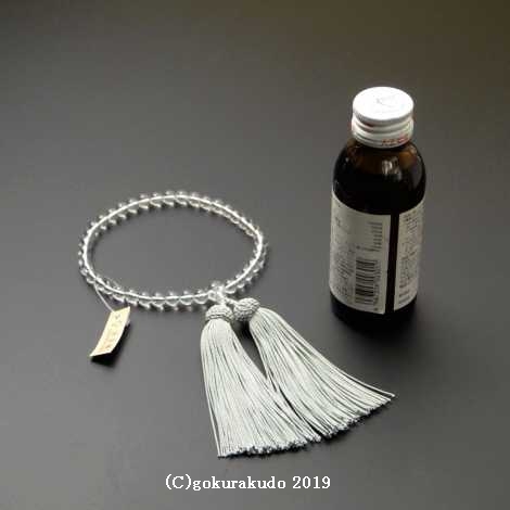 数珠 女性用 総水晶丸玉（主玉7mm）正絹頭付房 ひわ色の画像
