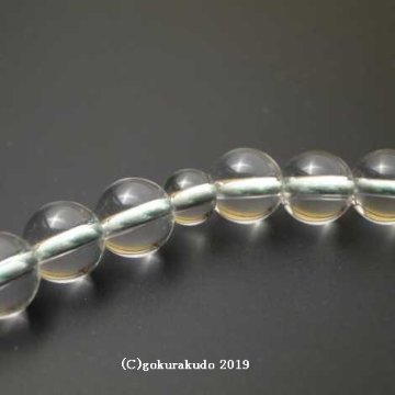 数珠 女性用 総水晶丸玉（主玉7mm）正絹頭付房 ひわ色の画像