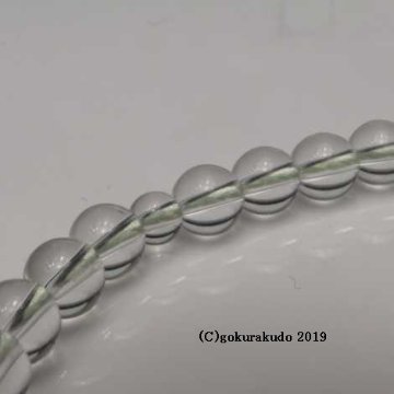 数珠 女性用 総水晶丸玉（主玉7mm）正絹頭付房 ひわ色の画像