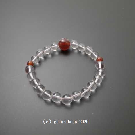数珠ブレス 親・2天メノウ(親玉に般若心経彫り入り)、主玉透明水晶8mm、ピンクゴム通しの画像