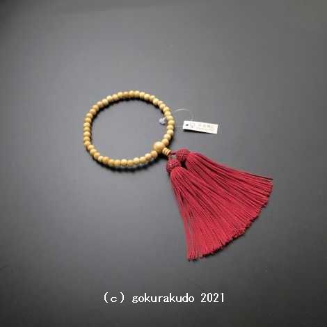 数珠 女性用 総柘植(つげ) 主玉(おもだま)7mm 正絹頭付き房の画像