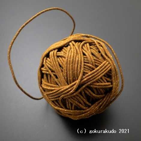 数珠用正絹紐39番(茶色に金色の点々入り)1ｍ当たり の画像