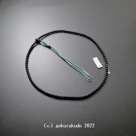 数珠 臨済宗 総黒オニキス 尺 正絹緑青色紐房の画像