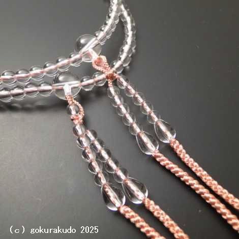 数珠 真言宗 総水晶 尺 珊瑚色利休房の画像
