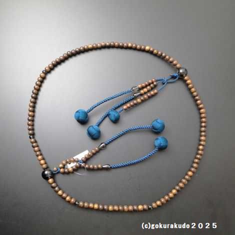 数珠 日蓮宗・法華宗 主玉(おもだま)栴檀、 (親・四天・つゆ)茶水晶、尺2 鉄紺色利休房の画像