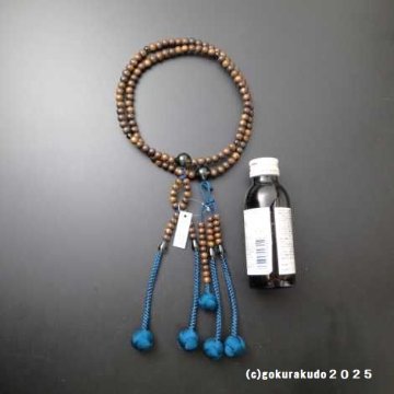 数珠 日蓮宗・法華宗 主玉(おもだま)栴檀、 (親・四天・つゆ)茶水晶、尺2 鉄紺色利休房の画像