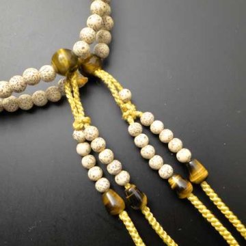数珠 真言宗 尺 主玉星月菩提樹、(親・４天・つゆ)虎目石入、金茶色（ほぼ黄色）利休房の画像
