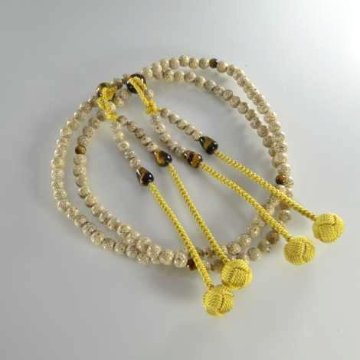 数珠 真言宗 尺 主玉星月菩提樹、(親・４天・つゆ)虎目石入、金茶色（ほぼ黄色）利休房の画像