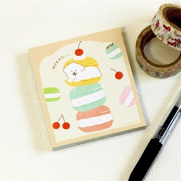 お菓子などうぶつ工房　メモパッド（はさまれワンコ）の画像