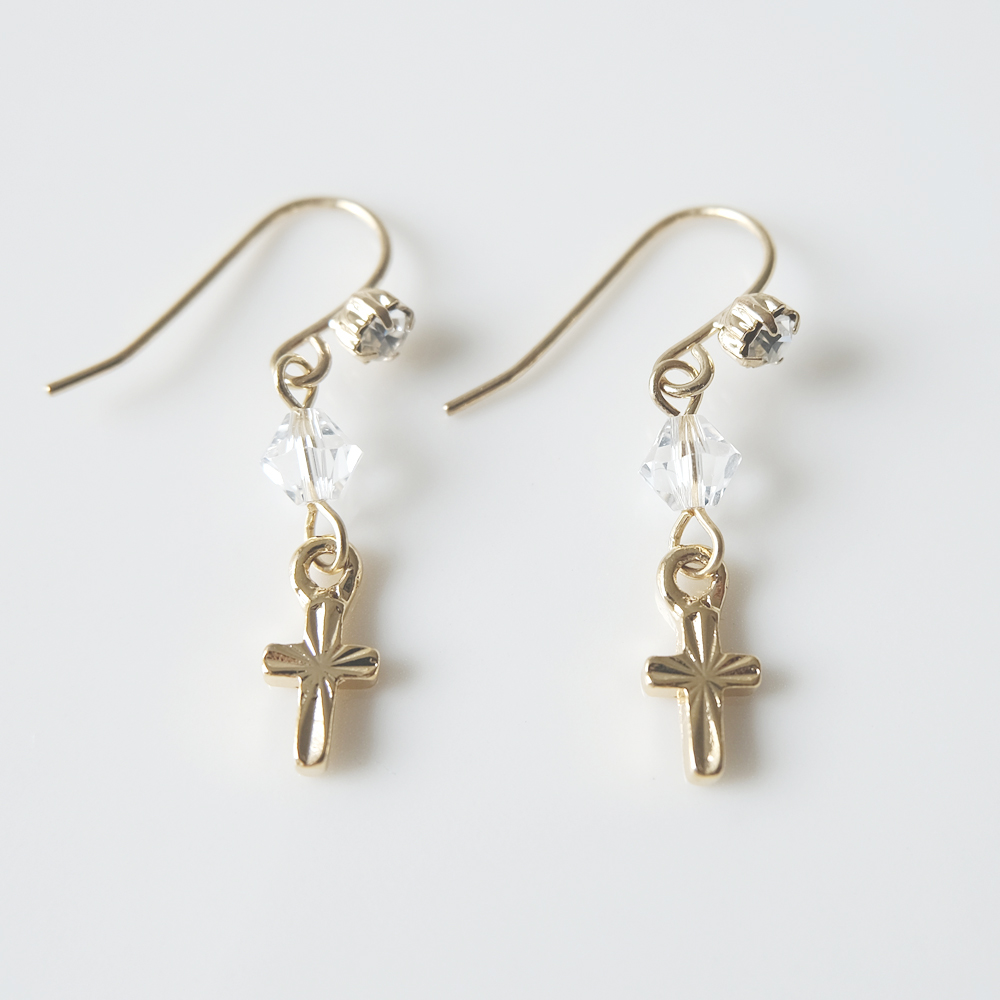 クリアーなガラスにクロスをセットしたピアスの画像