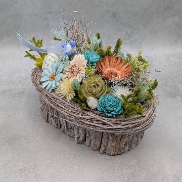 小鳥のフラワーバスケットアレンジの画像