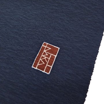 伊藤 中「両国 / 相撲のモチーフ」九寸名古屋帯 染め帯 青褐色（青みの濃グレー系）＜お仕立て代込＞の画像