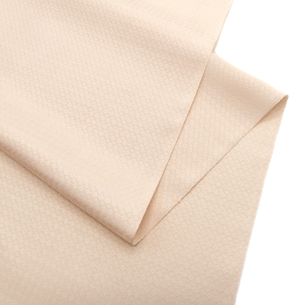 ＜お仕立て代込＞下井信彦 「草木下井紬 着尺」 淡香色（サーモンピンク系）の画像