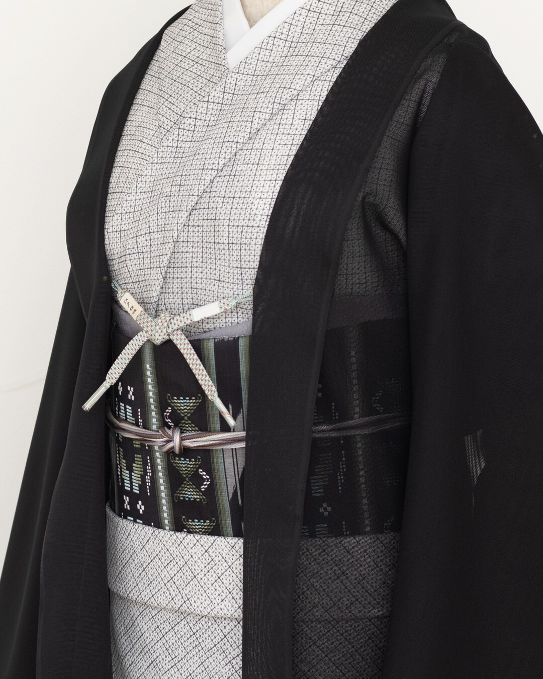 南風原花織 九寸名古屋帯 野原俊雄 紫がかった濃紺に鶸萌黄 （緑系）＜お仕立て代込＞の画像