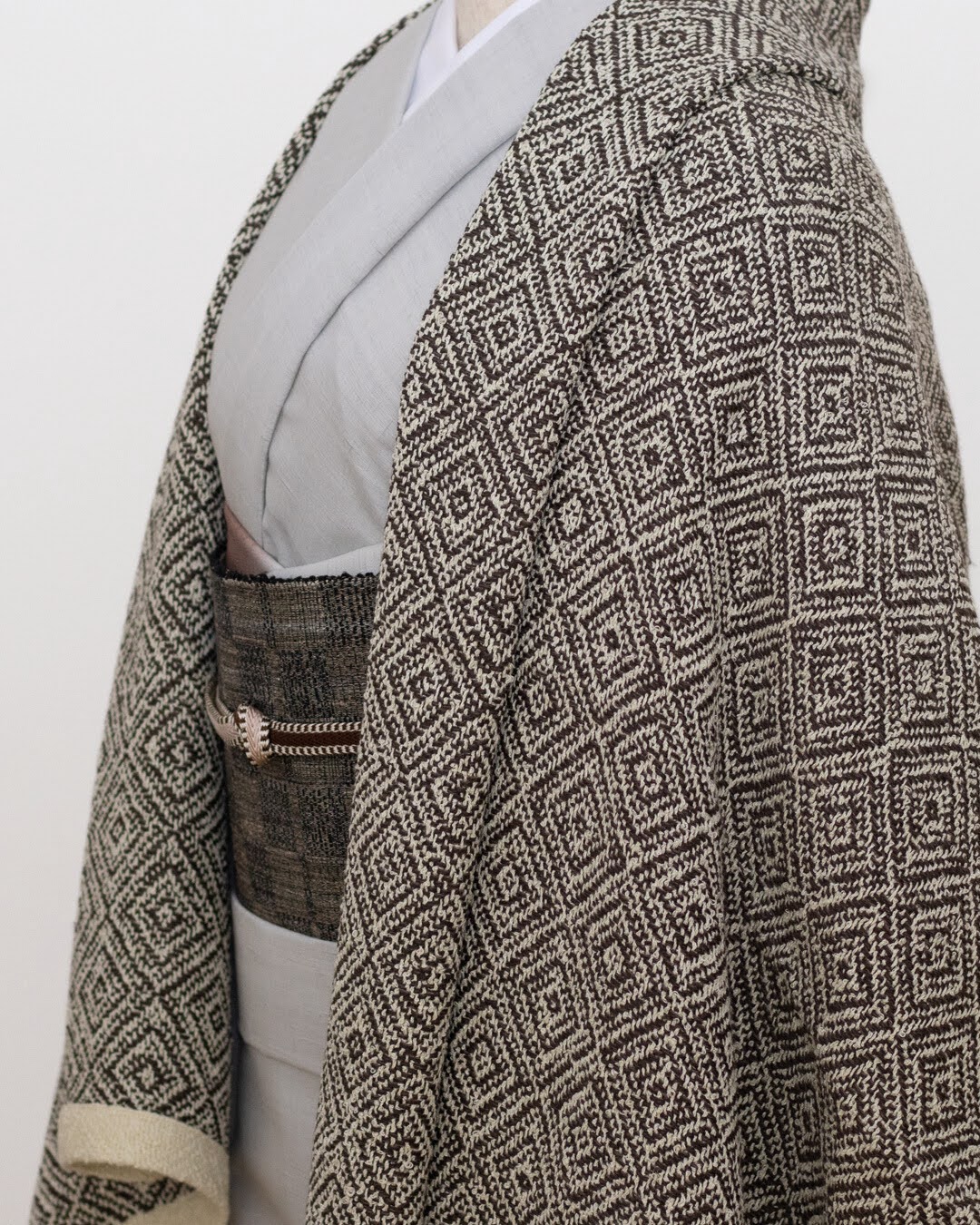 小倉商店 本場結城紬 「絣残糸・地機」 八寸名古屋帯 黒と灰色の変わり市松＜お仕立て代込＞の画像