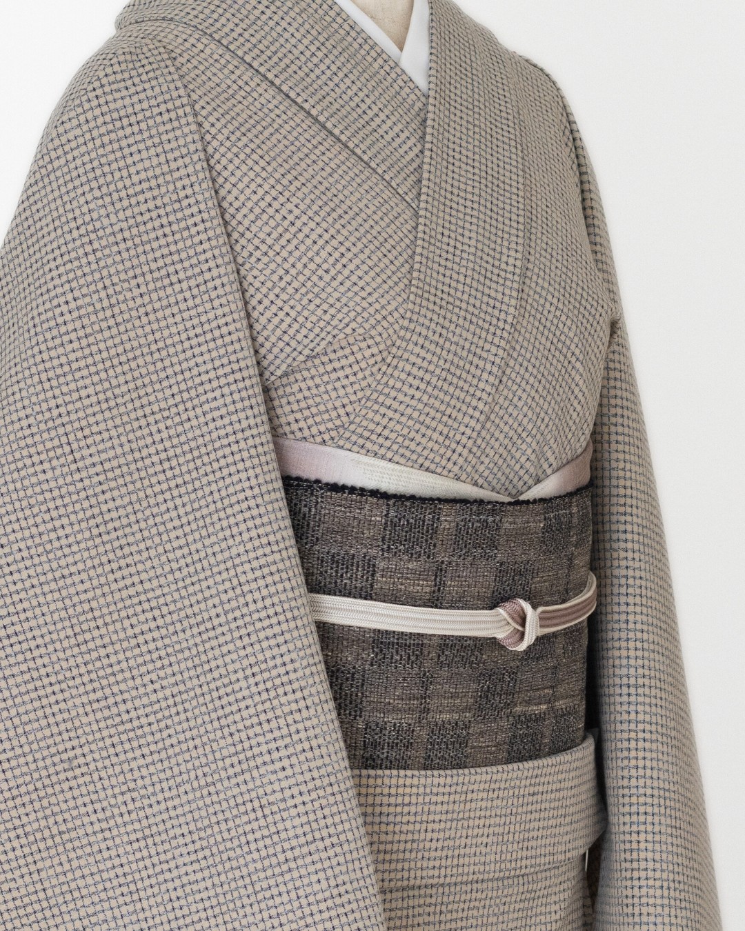 小倉商店 本場結城紬 「絣残糸・地機」 八寸名古屋帯 黒と灰色の変わり市松＜お仕立て代込＞の画像