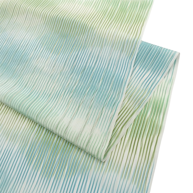 吉澤 「筬波明石（十日町明石縮）経絣」 白よごしに浅縹と柳染 着尺＜お仕立て代込＞の画像