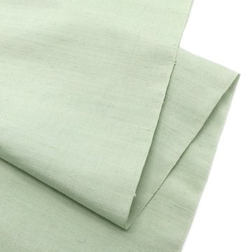 ＜お仕立て代込＞本場久米島紬（織り手：島袋伸子） 「ウージ染・無地」 着尺 白緑色の画像
