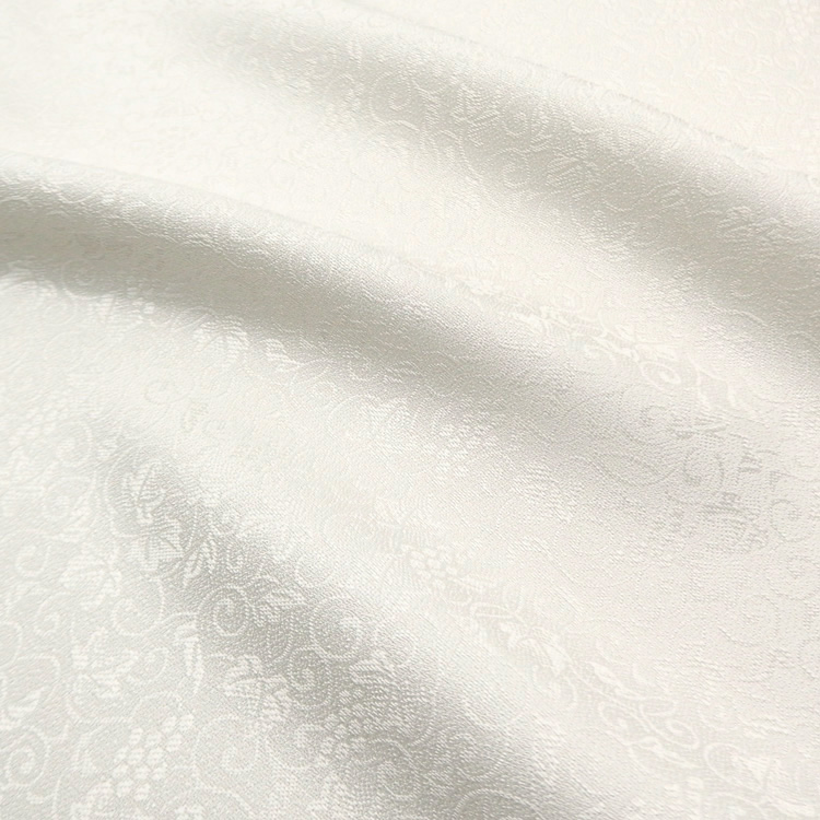 ＜お仕立て代込＞京都丹後の機屋×千成堂着物店 「葡萄唐草 伊予生糸 一尺三分着尺」 象牙色（色無地）の画像