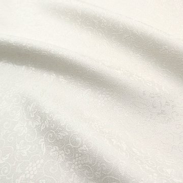 ＜お仕立て代込＞京都丹後の機屋×千成堂着物店 「葡萄唐草 伊予生糸 一尺三分着尺」 象牙色（色無地）の画像
