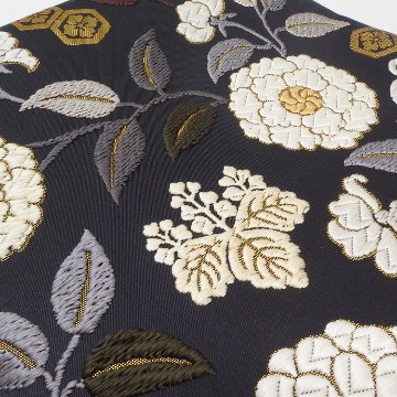 ＜お仕立て代込＞鈴木織物 「菊に桐椿唐草文様」 唐綾錦 袋帯 烏羽色（黒に近い・紫みの濃茶）の画像