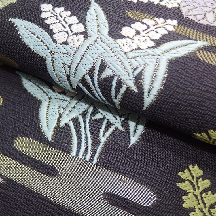 ＜お仕立て代込＞鈴木織物 「霞と葵」 水衣錦 袋帯 焦茶（紫がかった、濃いめの灰茶色）の画像