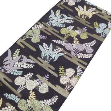 ＜お仕立て代込＞鈴木織物 「霞と葵」 水衣錦 袋帯 焦茶（紫がかった、濃いめの灰茶色）の画像