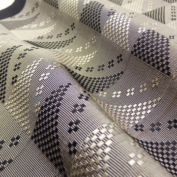 ＜お仕立て代込＞祝嶺恭子 「首里花織（首里グーシ花織）」 九寸名古屋帯 墨と焦茶の画像