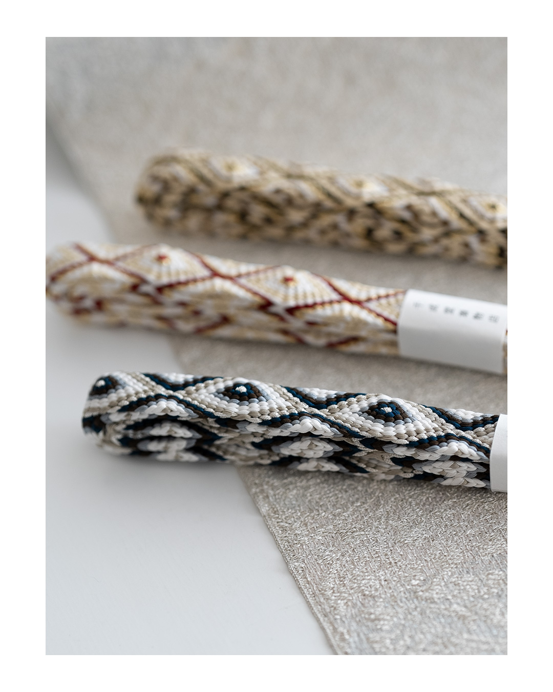 千成堂着物店 帯締め 「手組唐組・切房 別注」 生成・白よごしに濃茶・金糸＜即日発送可＞の画像