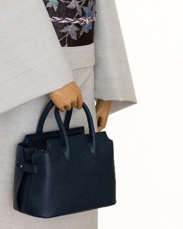 ＜お仕立て代込＞多ち花（たちばな）「ガルーダ（草花更紗）」 九寸名古屋帯 摺り友禅 染め帯 夏帯〜単衣帯 墨茶に青の画像