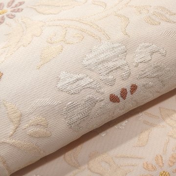 ＜お仕立て代込＞織楽浅野（しょくらくあさの）「唐草古渡文」九寸名古屋帯 象牙色（明るい灰みのベージュ系）の画像