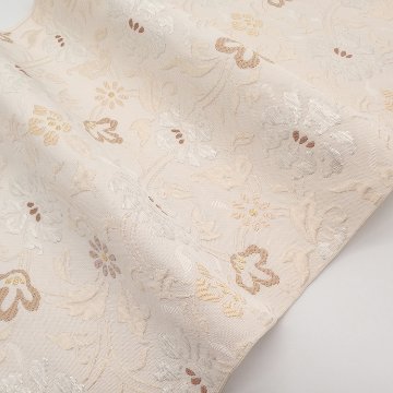 ＜お仕立て代込＞織楽浅野（しょくらくあさの）「唐草古渡文」九寸名古屋帯 象牙色（明るい灰みのベージュ系）の画像